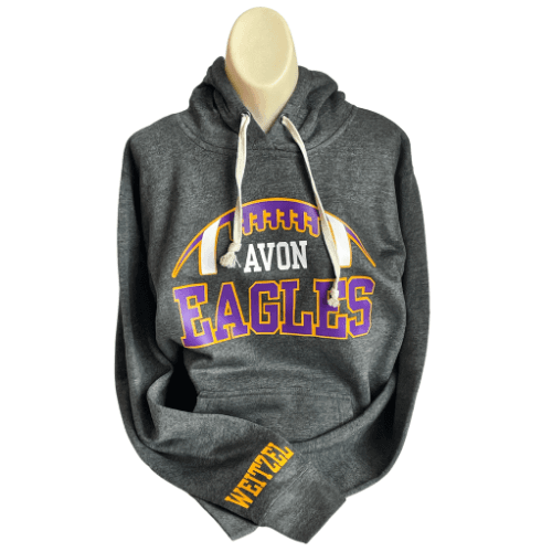 Adult super cozy triblend hoodie with a football Avon Eagles design and can be personalized with last name on cuff. Can be made in a cahrcoal black, solid black and grey.